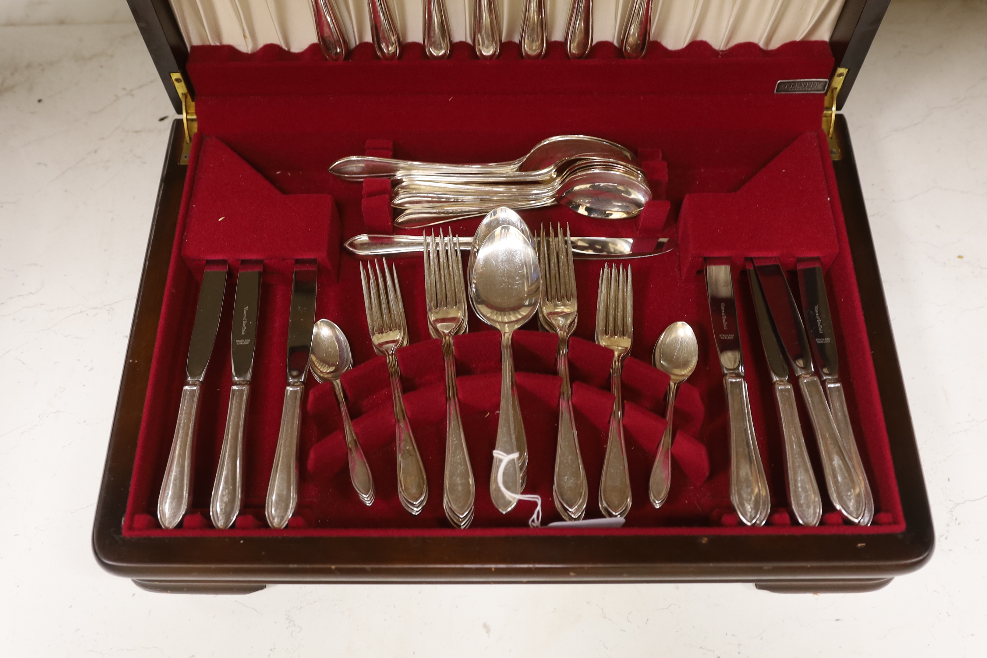 A wooden canteen and Sheffield Viners EPNS cutlery set for eight